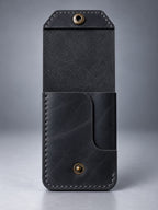 Back view of black compact leather snap pocket wallet