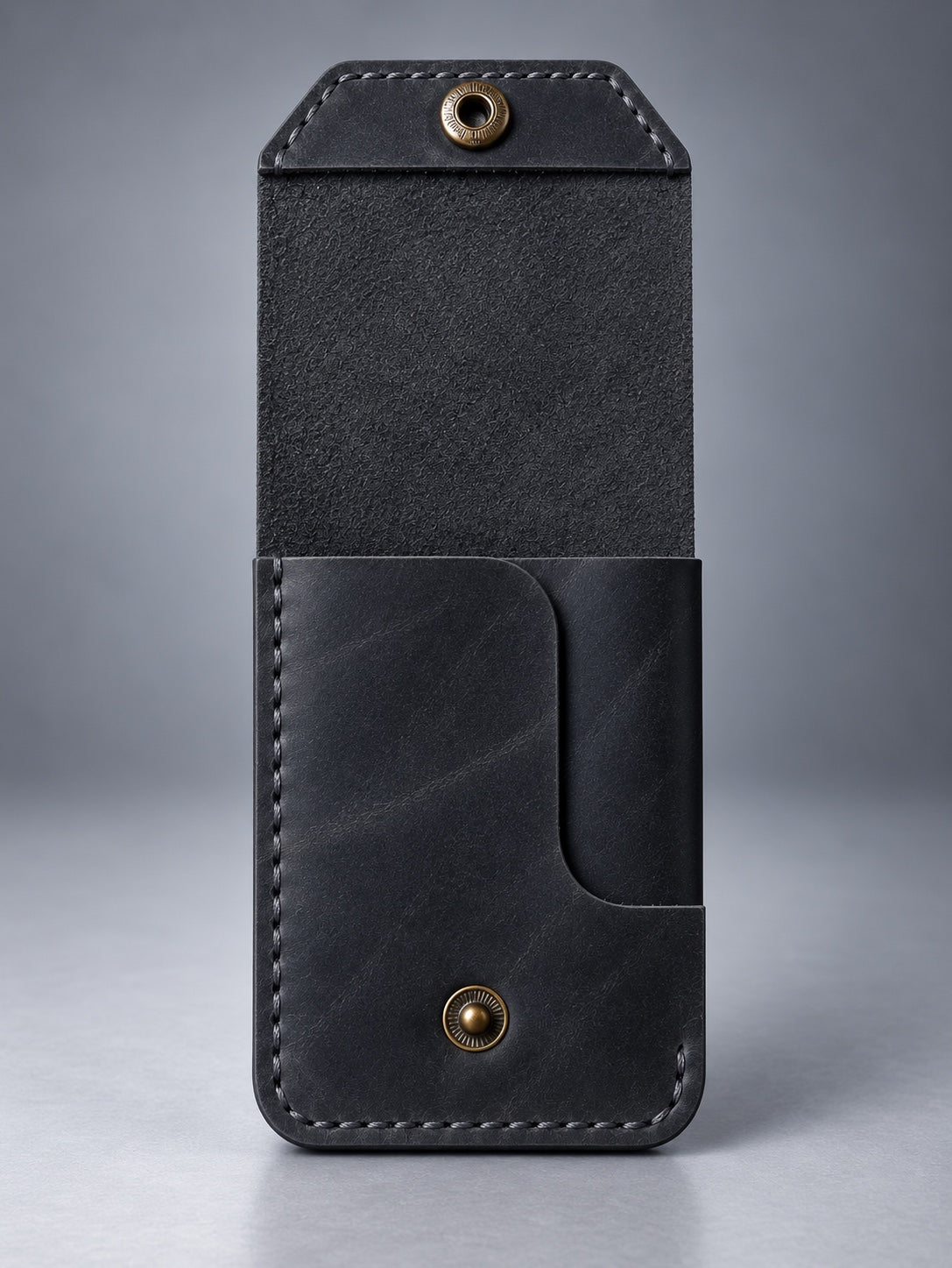 Back view of black compact leather snap pocket wallet