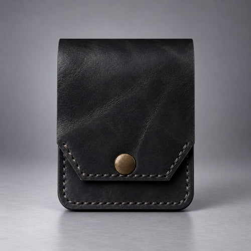 Black compact leather snap pocket wallet front view with stitched flap