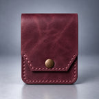 Burgundy compact leather snap pocket wallet front view
