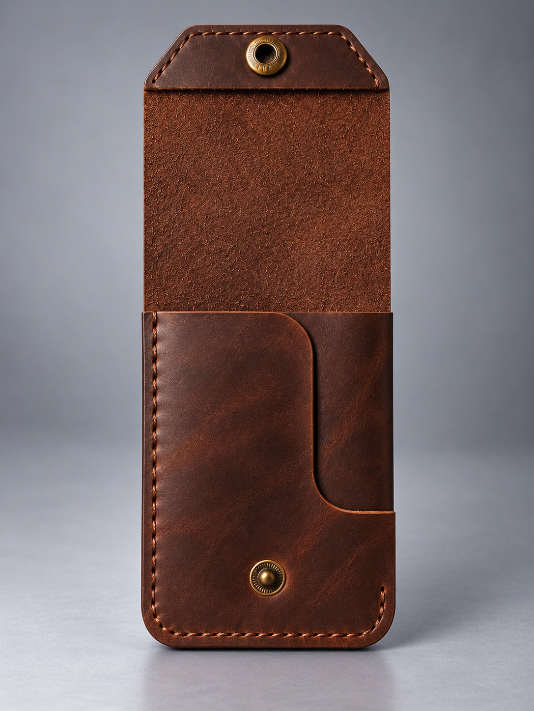 Back view of dark brown compact leather snap pocket wallet