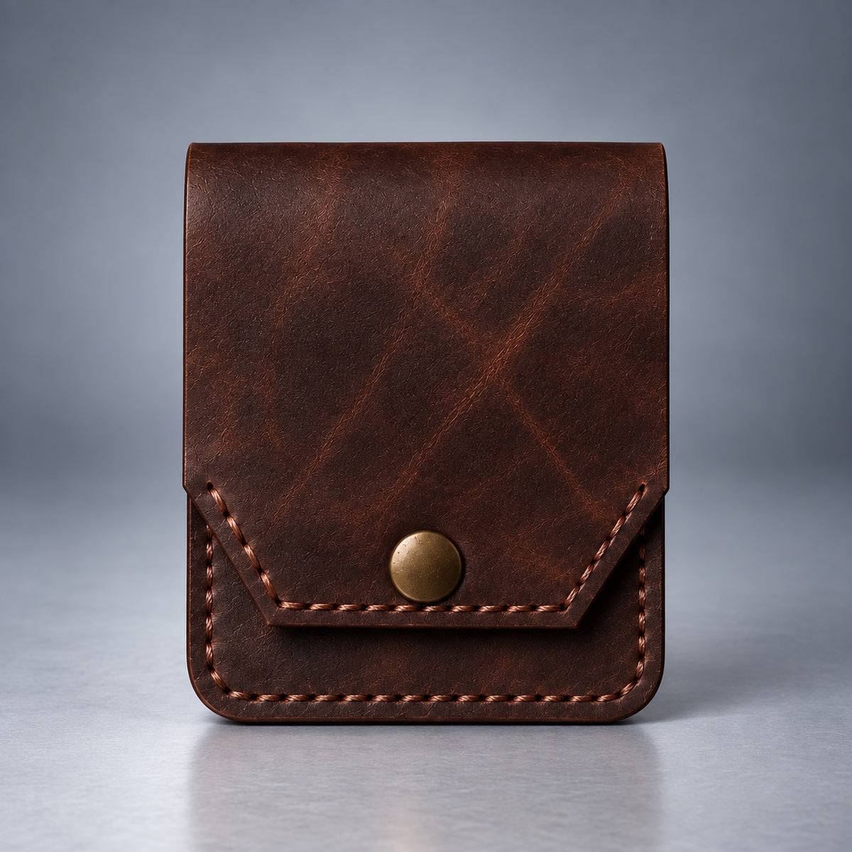 Dark brown compact leather snap pocket wallet front view