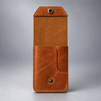 Back view of tan compact leather snap pocket wallet