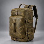 Olive green convertible leather backpack duffle bag with brass-tone hardware