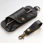 Black leather eyeglasses holder with snap flap and matching keychain loop