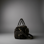 Black handmade genuine leather travel duffel bag side view | The Leather Factory