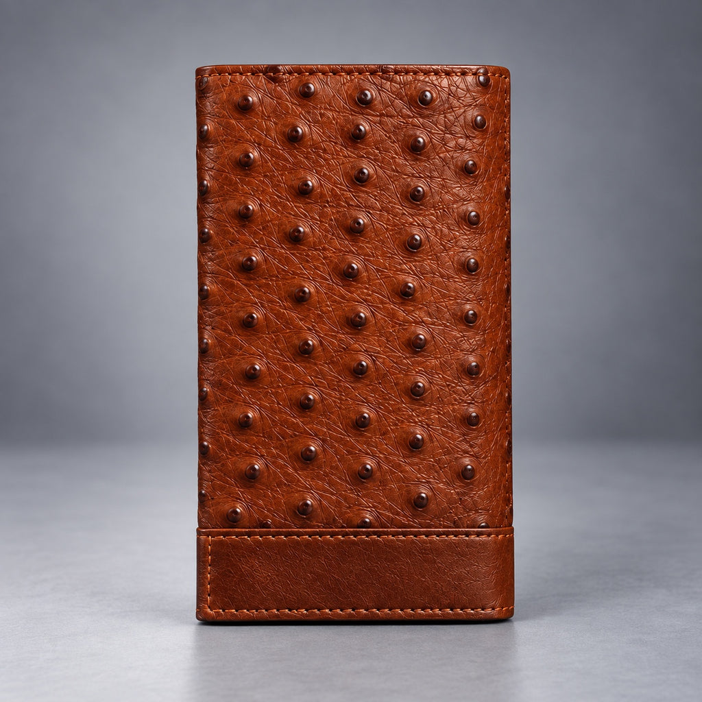 Brown ostrich leather travel wallet front view with raised quill texture and stitched lower panel
