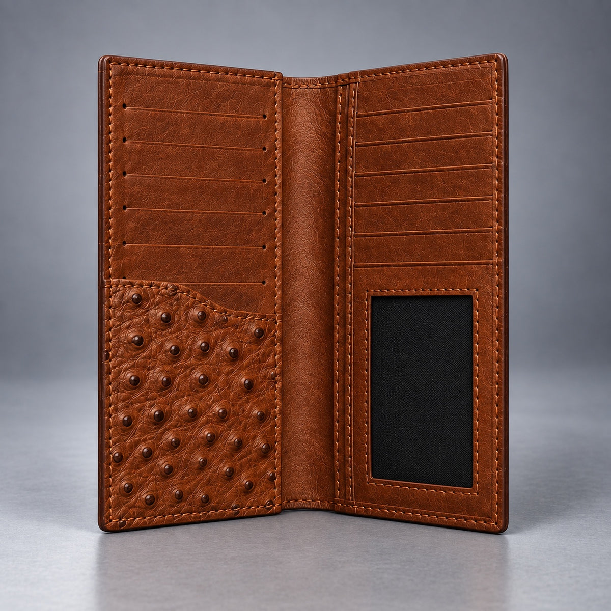 Open brown ostrich leather travel wallet showing card slots, note compartments and ID window