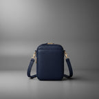 TLF leather crossbody bag in Navy, side view | The Leather Factory