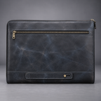 Back view of midnight blue leather laptop portfolio with zip pocket